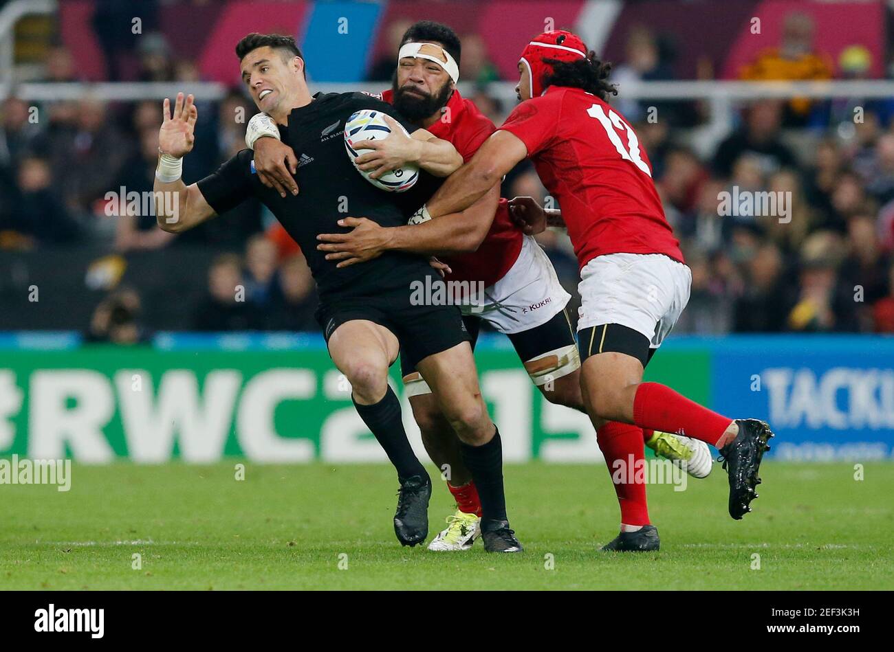 Rugby Union - New Zealand v Tonga - IRB Rugby World Cup 2015 Pool C - St  James' Park, Newcastle, England - 9/10/15 New Zealand's Dan Carter in  action with Tonga's Viliami