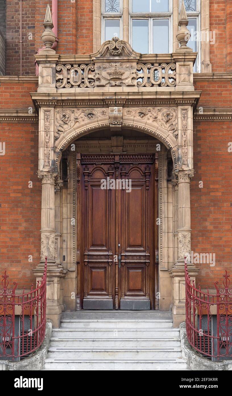 King's College, University of London, ornate old doorway with decorated stone columns Stock Photo