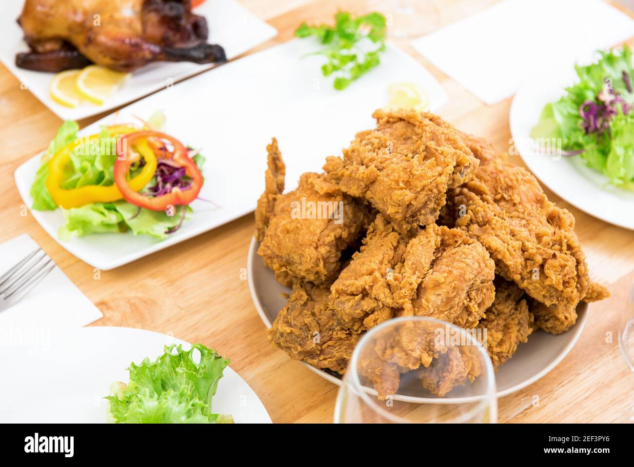 Chicken on dinning table, ready to eat Stock Photo