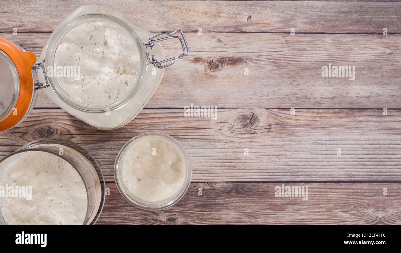 Flat lay. Baking homemade sourdough wheat bread in cast iron dutch oven