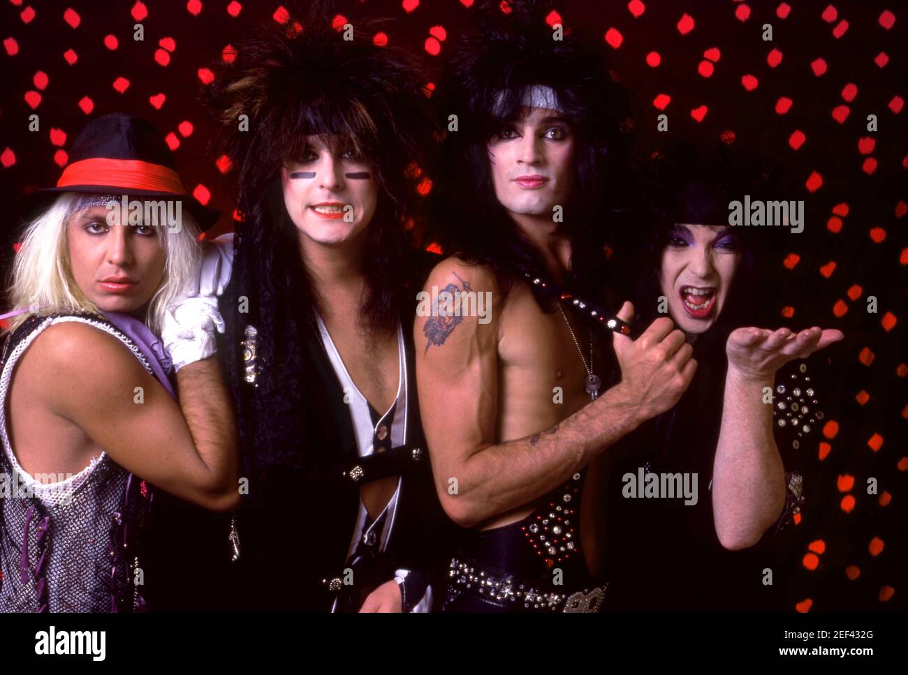 DETROIT, MI - SEPTEMBER 15: (L-R) Lead singer Vince Neil, bassist Nikki Sixx,  drummer Tommy Lee and lead guitarist Mick Mars of the American hard rock band  Motley Crue pose for a