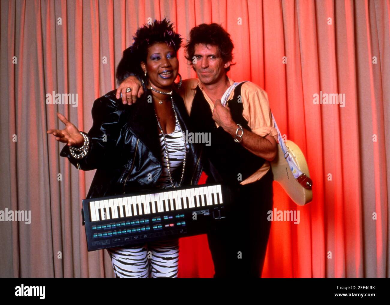 DETROIT, MI - OCTOBER 24: Aretha Franklin (1942-2018) and Keith Richards of  the Rolling Stones pose for a studio portrait for Aretha's version of Jumpin'  Jack Flash for the movie "Jumpin' Jack