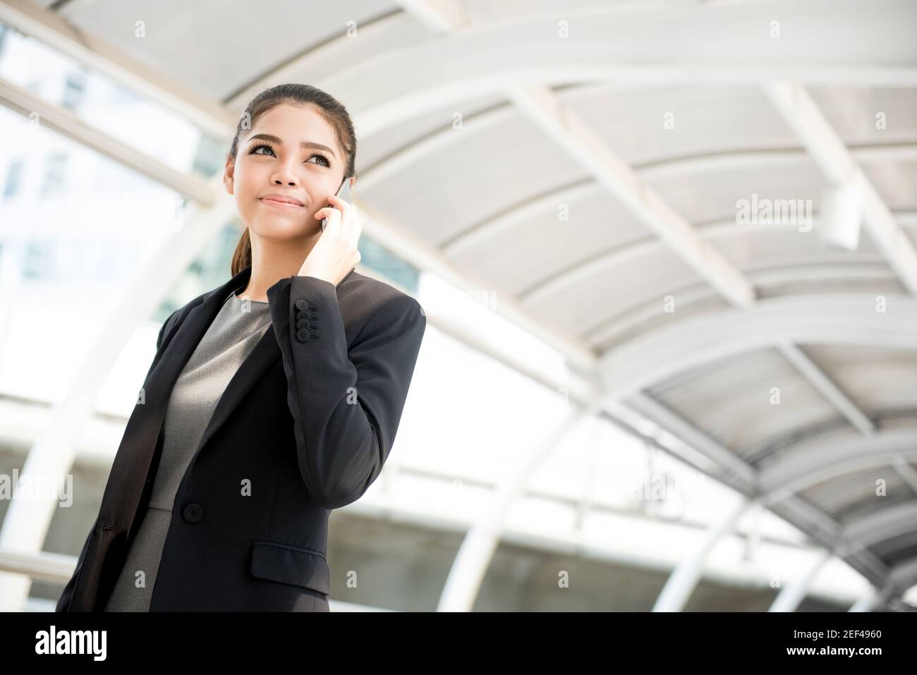 Young attractive asian woman phone hi-res stock photography and images ...