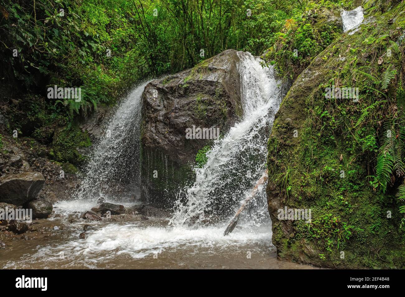 Largest waterfall in Los Cuchos in Atahualpa village near Quito, Ecuador. Stock Photo