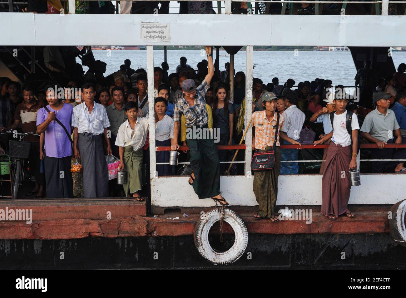 22.11.2013, Yangon, Myanmar, Asia - Commuters on a Yangon to Dala (Dalah) Ferry arrive at the Dala Ferry Terminal after crossing the Yangon River. Stock Photo