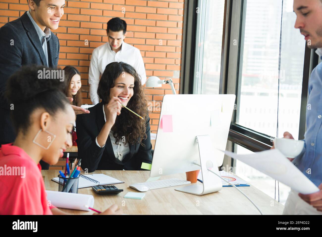 Multiethnics business people in co-working space Stock Photo