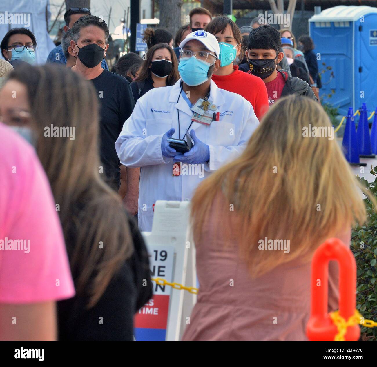 Los Angeles United States 17th Feb 2021 Dr Jerry P Abraham Stands Amongst Local Residents Waiting In Line To Receive A Covid-19 Vaccination Shot At The Kedren Community Health Center In South