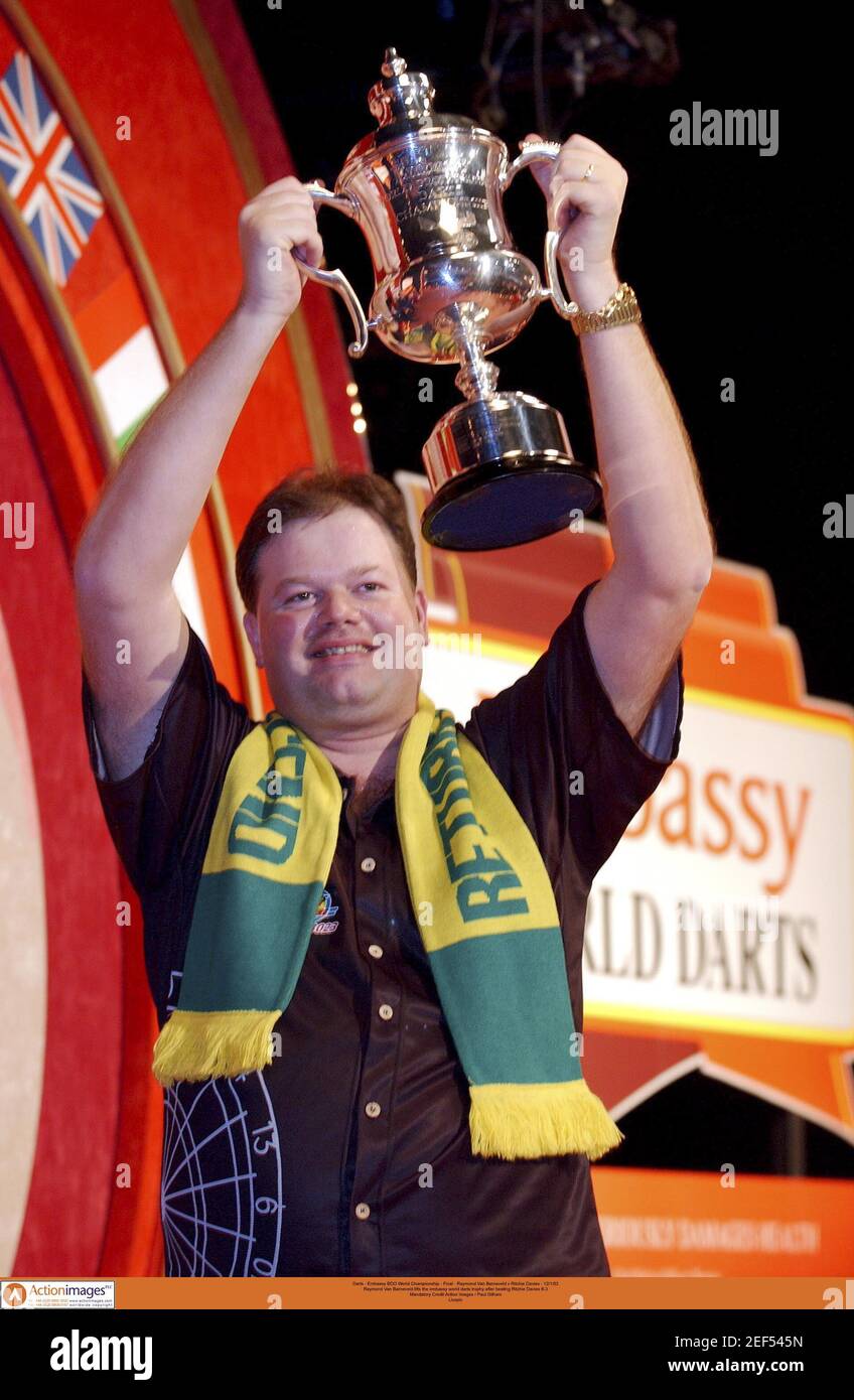 Darts - Embassy BDO World Championship - Final - Raymond Van Barneveld v  Ritchie Davies - 12/1/03 Raymond Van Barneveld lifts the embassy world darts  trophy after beating Ritchie Davies 6-3 Mandatory