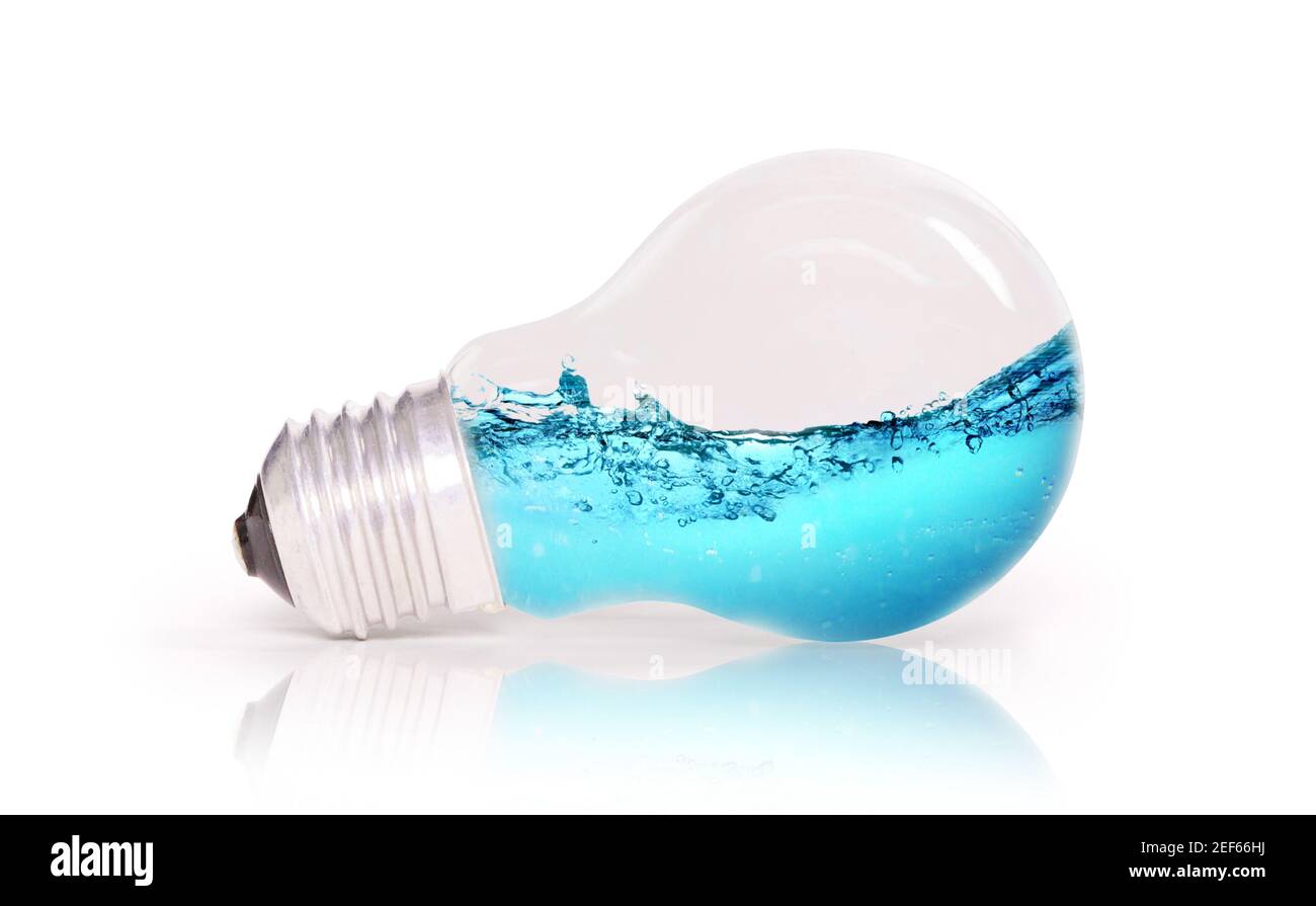 Lightbulb with water inside, isolated on white Stock Photo - Alamy