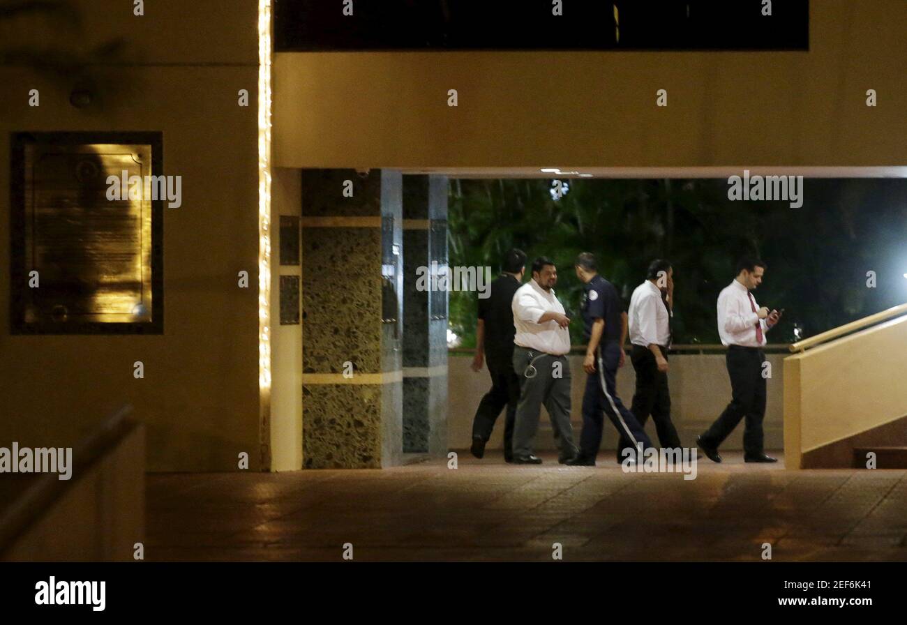 People work near an escalator in the headquarters of CONMEBOL in Luque, Paraguay, January 7, 2016. Paraguayan state prosecutors on Thursday raided the headquarters of South American soccer confederation CONMEBOL, in a further development in the corruption scandal rocking the business of global soccer. REUTERS/Jorge Adorno   Picture Supplied by Action Images Stock Photo