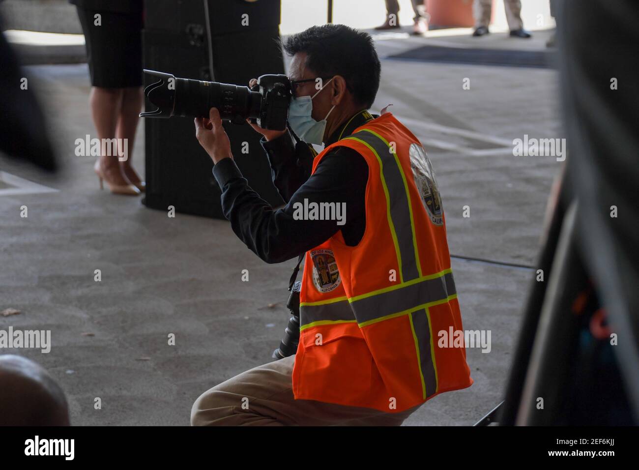 Chief photographer for LA County Board of Supervisors Bryan Chan during a press conference relating to the opening of a state and federal mass vaccina Stock Photo