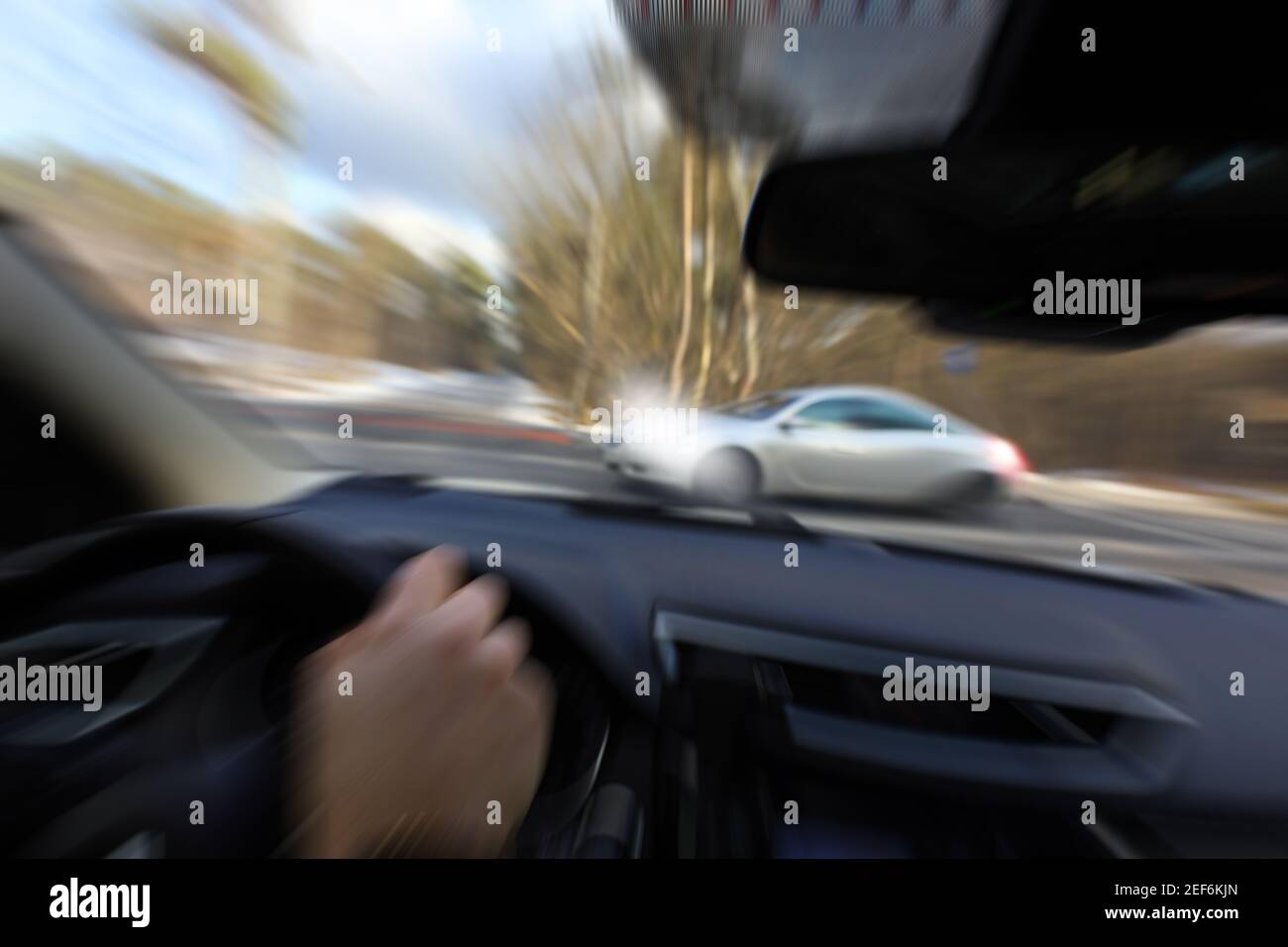 forcing the right of way by another car and sudden braking Stock Photo