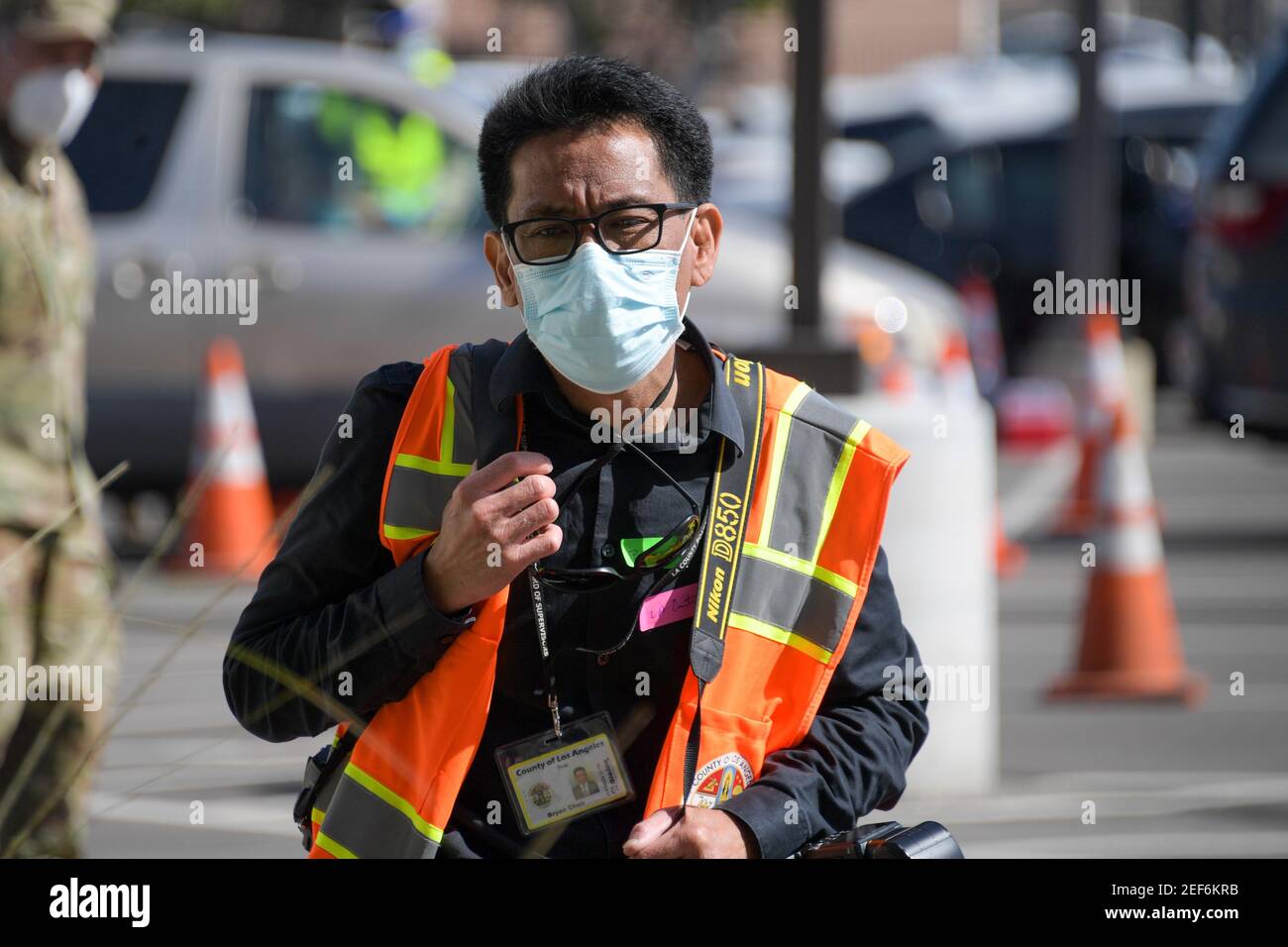 Chief photographer for LA County Board of Supervisors Bryan Chan during a press conference relating to the opening of a state and federal mass vaccina Stock Photo