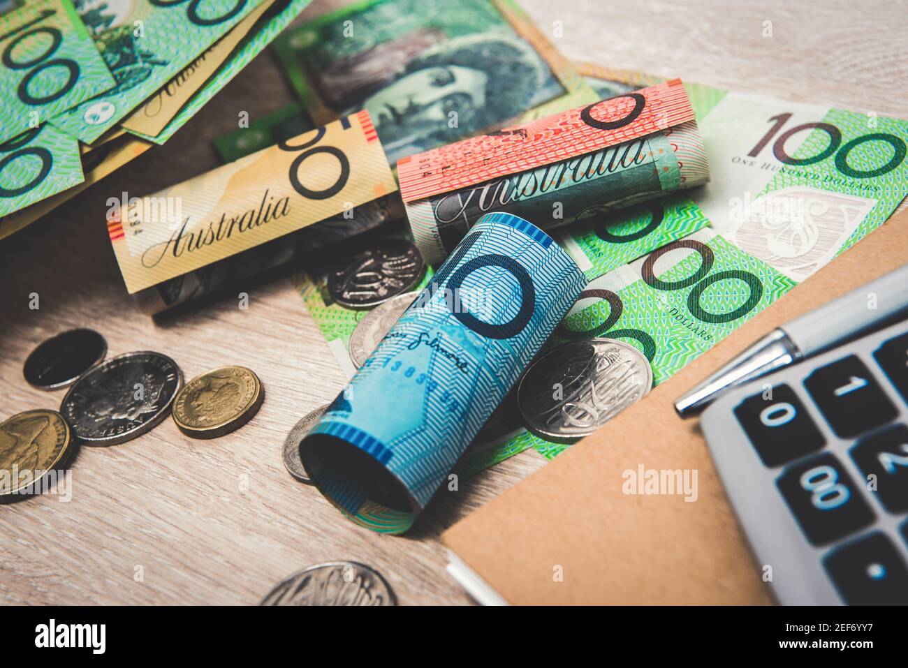 Money, Australian dollars (AUD), with notebook and calculator on the table  - financial and investment concepts Stock Photo - Alamy