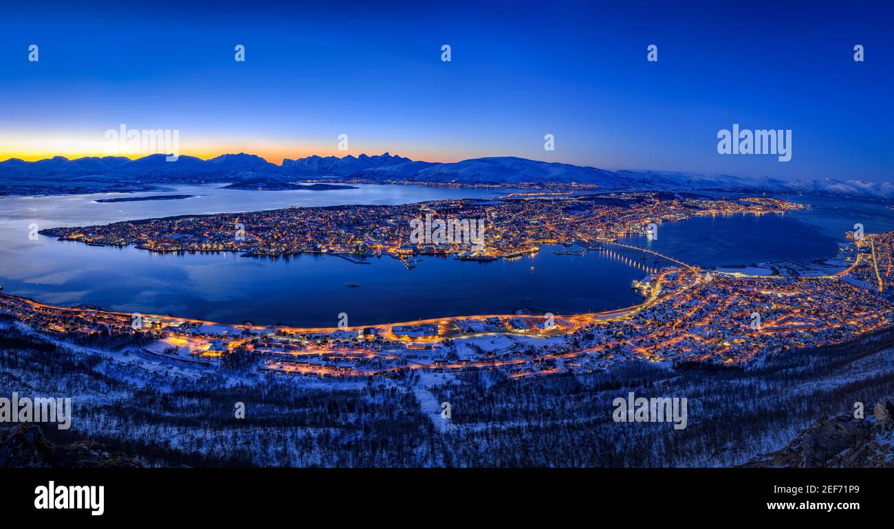Winter twilight and evening in Tromsø, seen from the viewpoint of Fjellstua Utsiktspunkt on the top of Fjellheisen Tromsø Cable car (Tromsø, Norway) Stock Photo