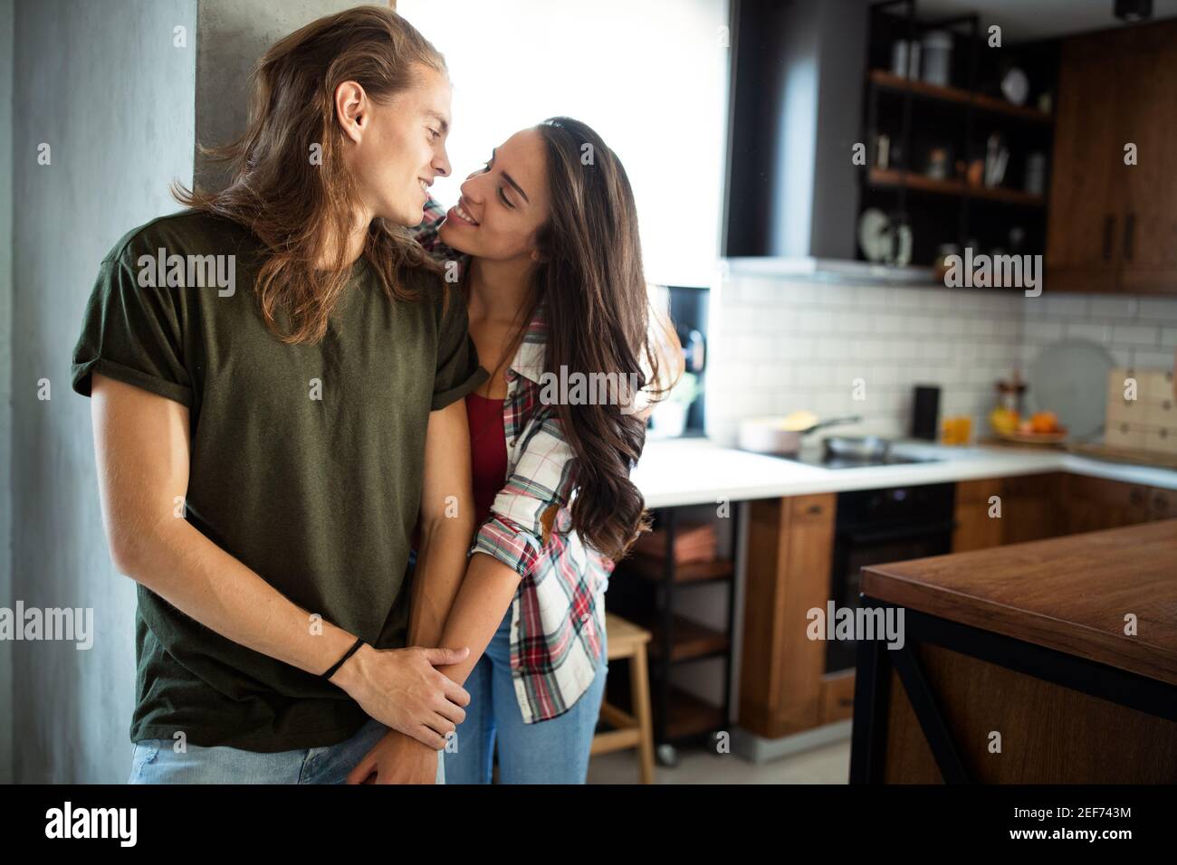 Sentimental happy couple in love bonding and kissing Stock Photo Alamy