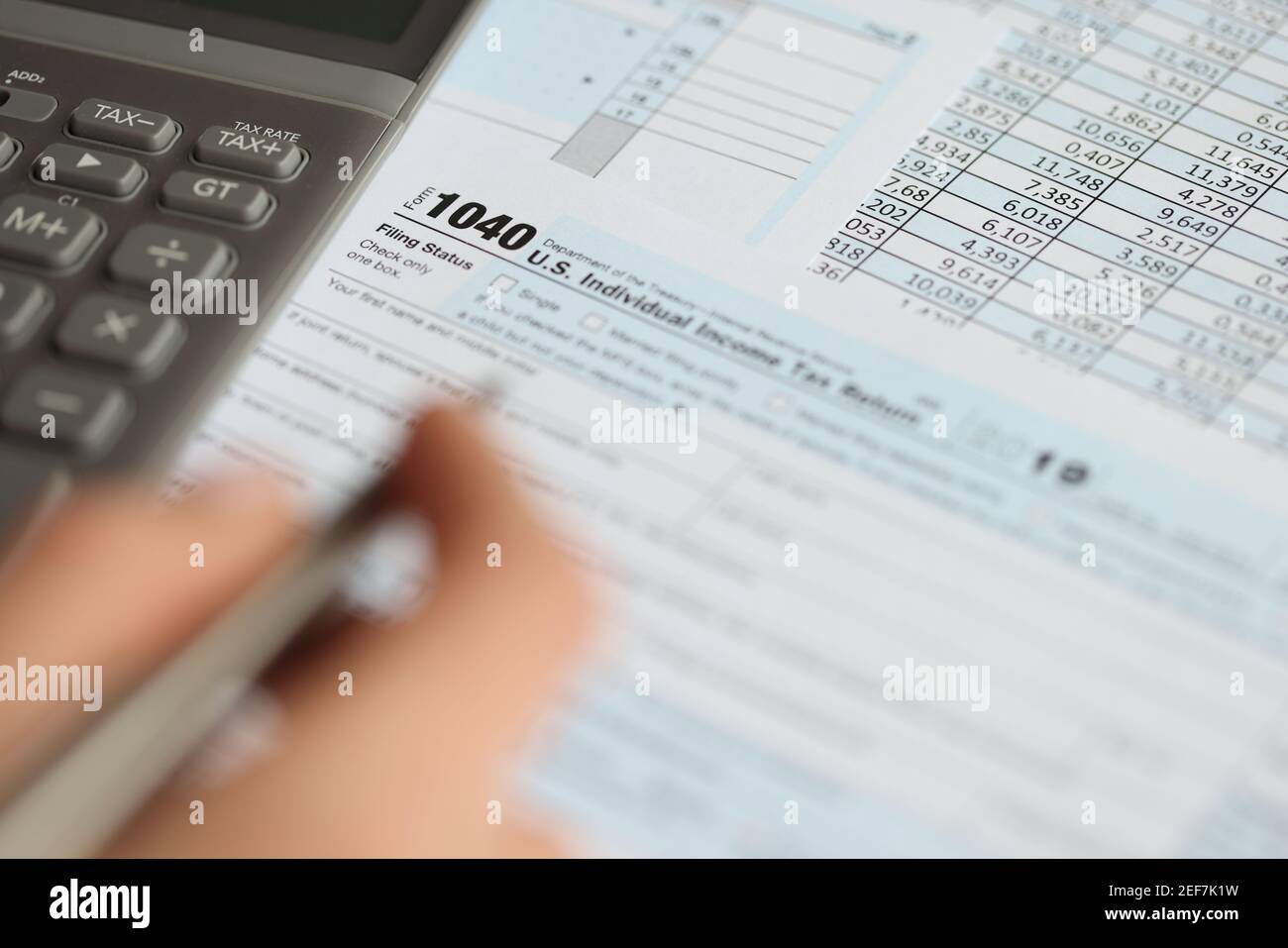 on-table-is-tax-deduction-form-and-calculator-stock-photo-alamy