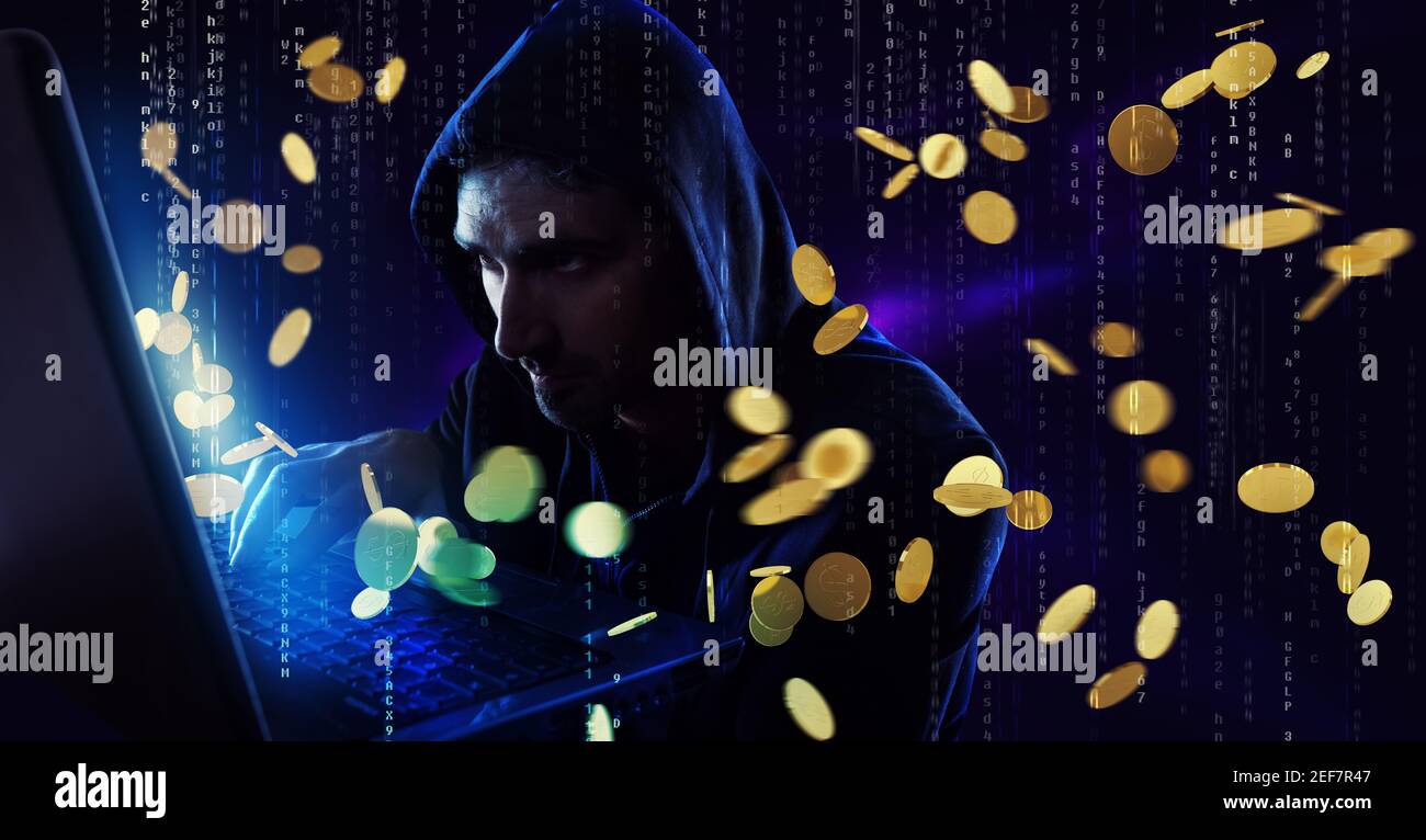 Hacker catches money from a bank account. Concept of internet security Stock Photo