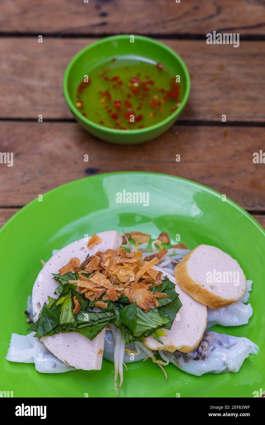 Plate of traditional Vietnamese breakfast - Banh Cuon, rice noodle ...