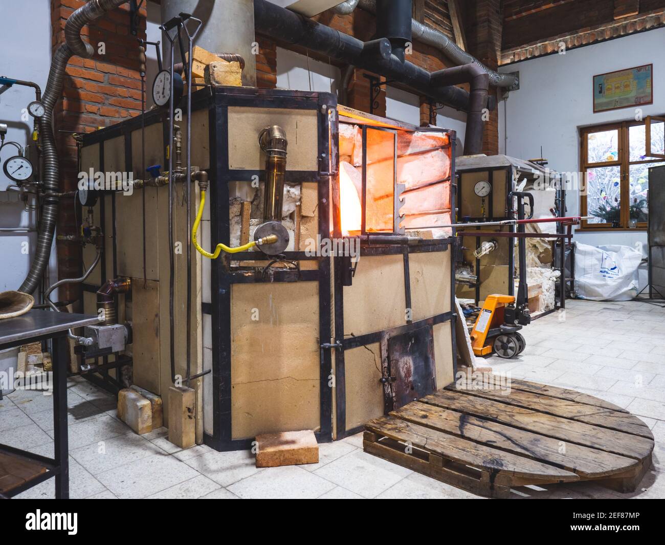 Glass blowing process in traditional artistic Softening glass