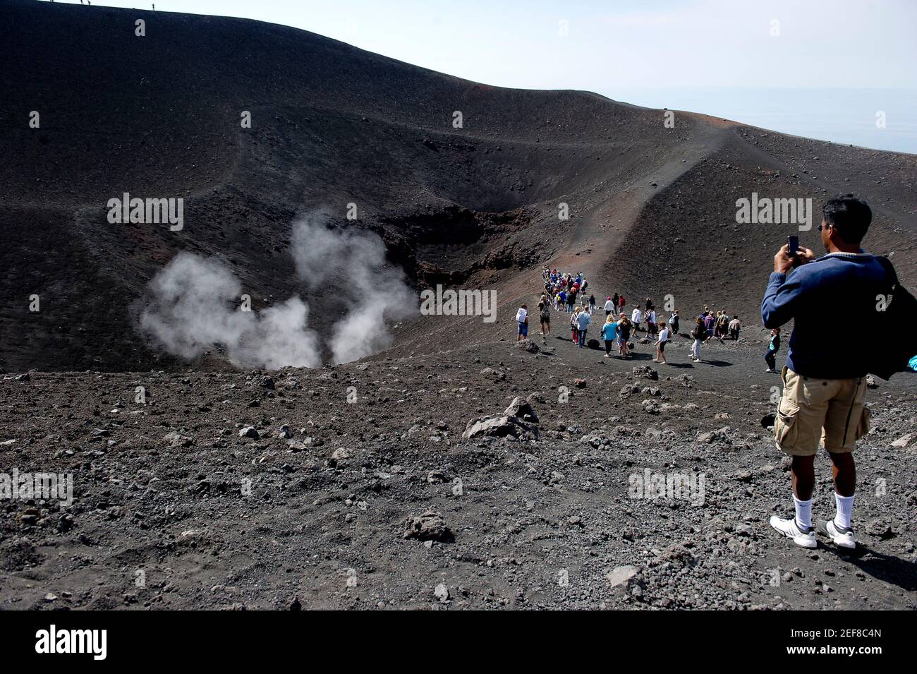 Europe, Italy, Sicily, on the Etna volcano, visiting tourist, Province of Catania Stock Photo