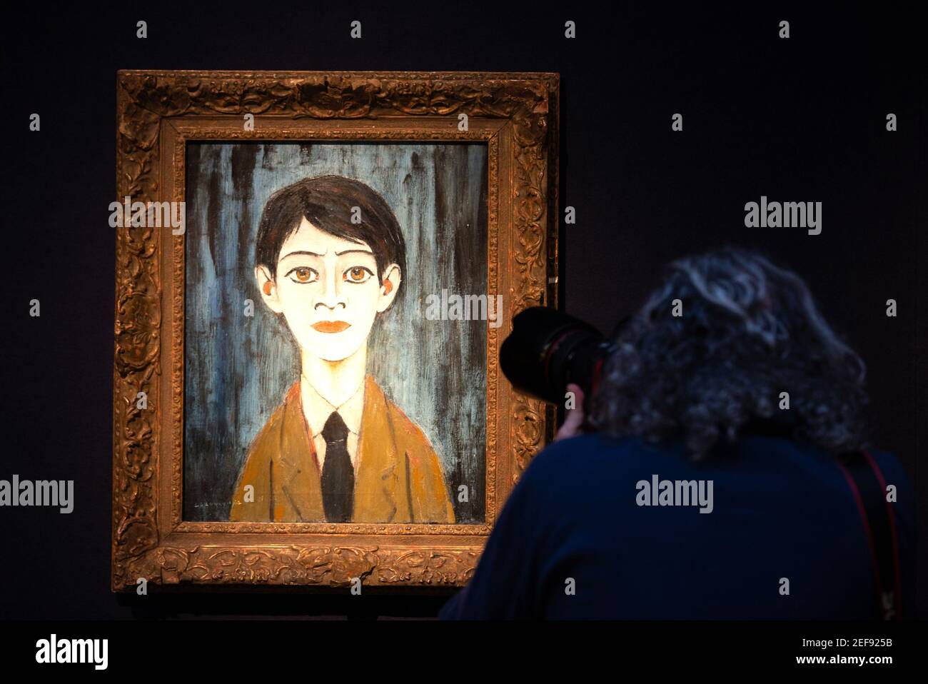 London, UK. 17th Feb, 2021. Head of a Boy painted by Laurence Stephen Lowry, Painted in 1962, Estimate: £300,000-500,000 'Behind Closed Doors: Preparations take place at Christie's ahead of the livestreamed Modern British Art Auction on 1 March 2021'. Credit: Mark Thomas/Alamy Live News Stock Photo