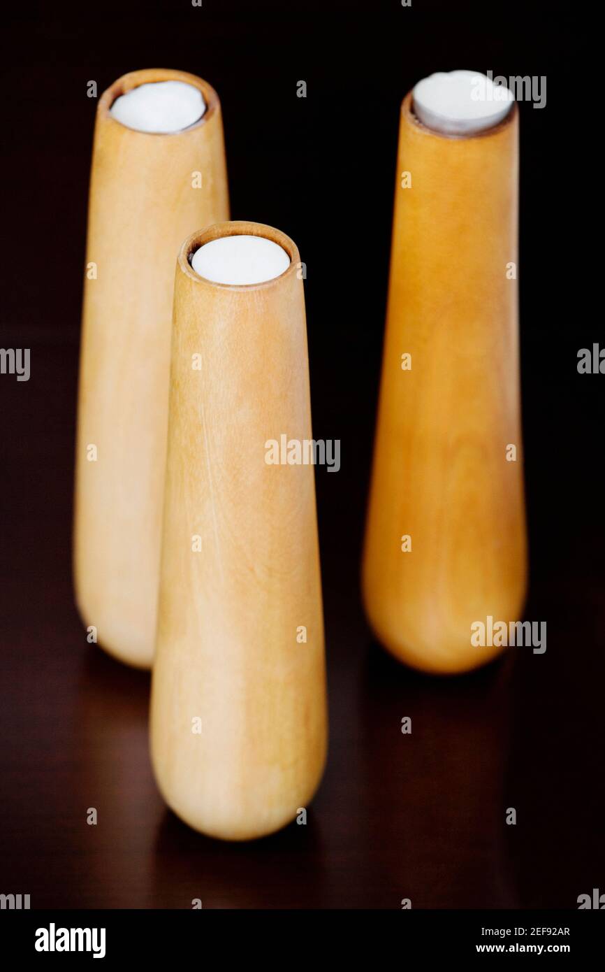 Close-up of three candlestick holders Stock Photo