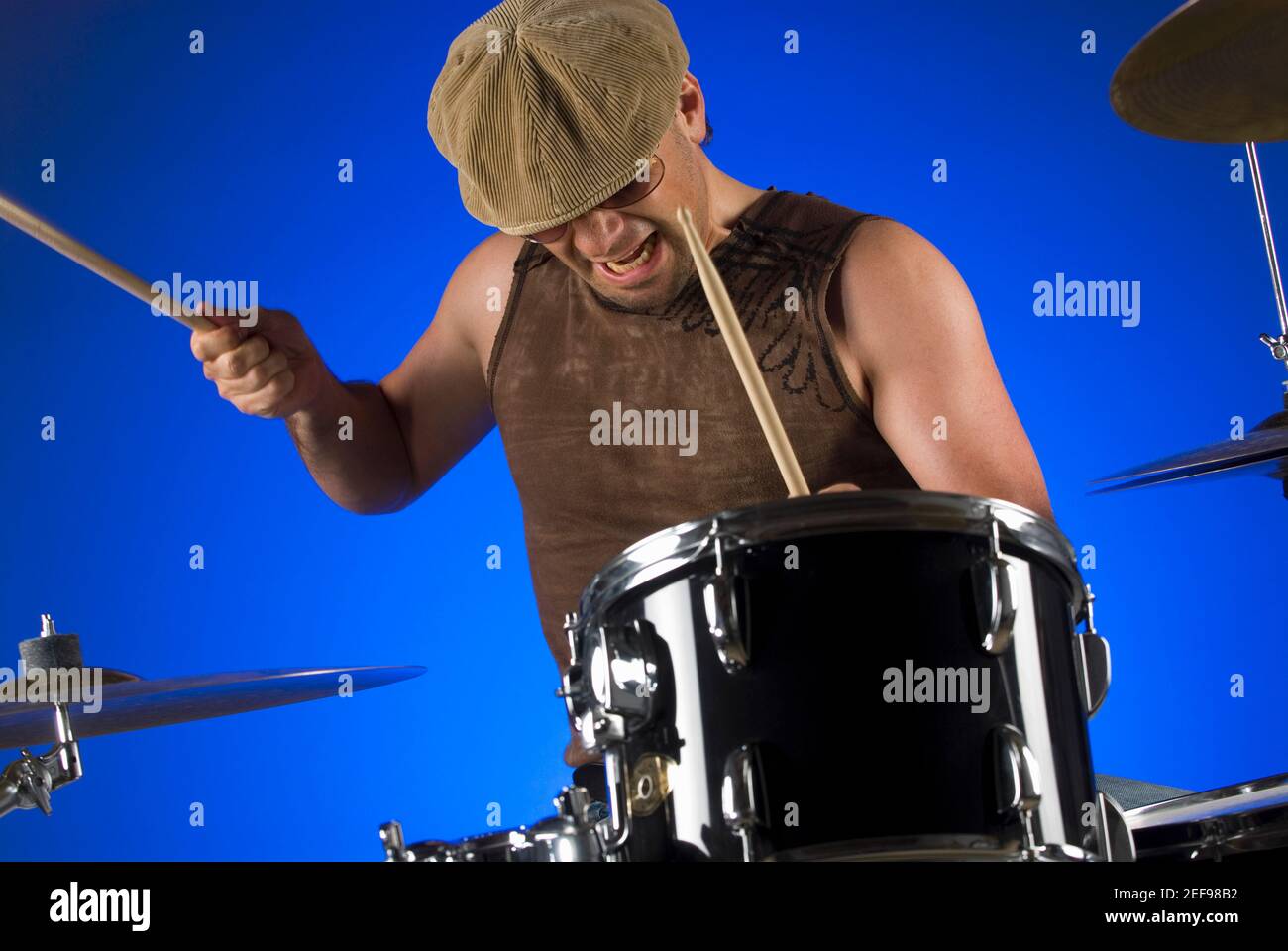 Male drummer playing drums Stock Photo Alamy