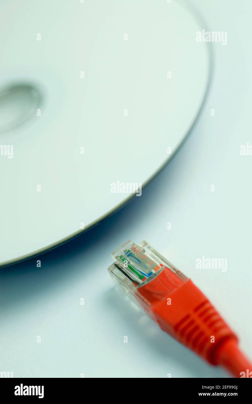 Close up of a computer cable with a cd Stock Photo