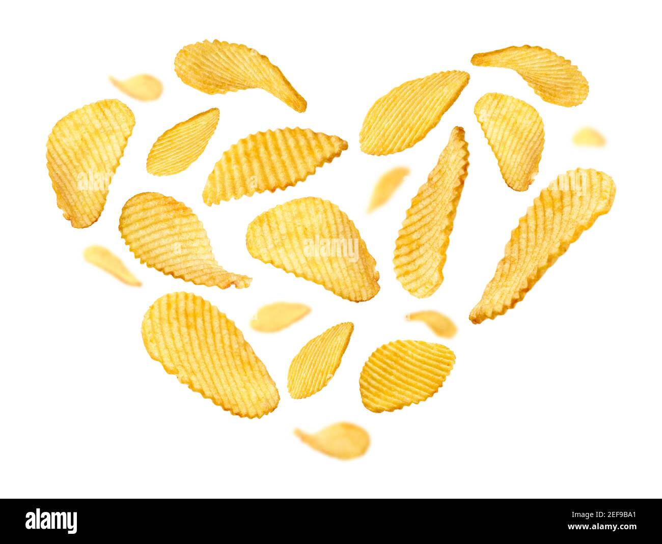Fluted potato chips in the shape of a heart on a white background Stock