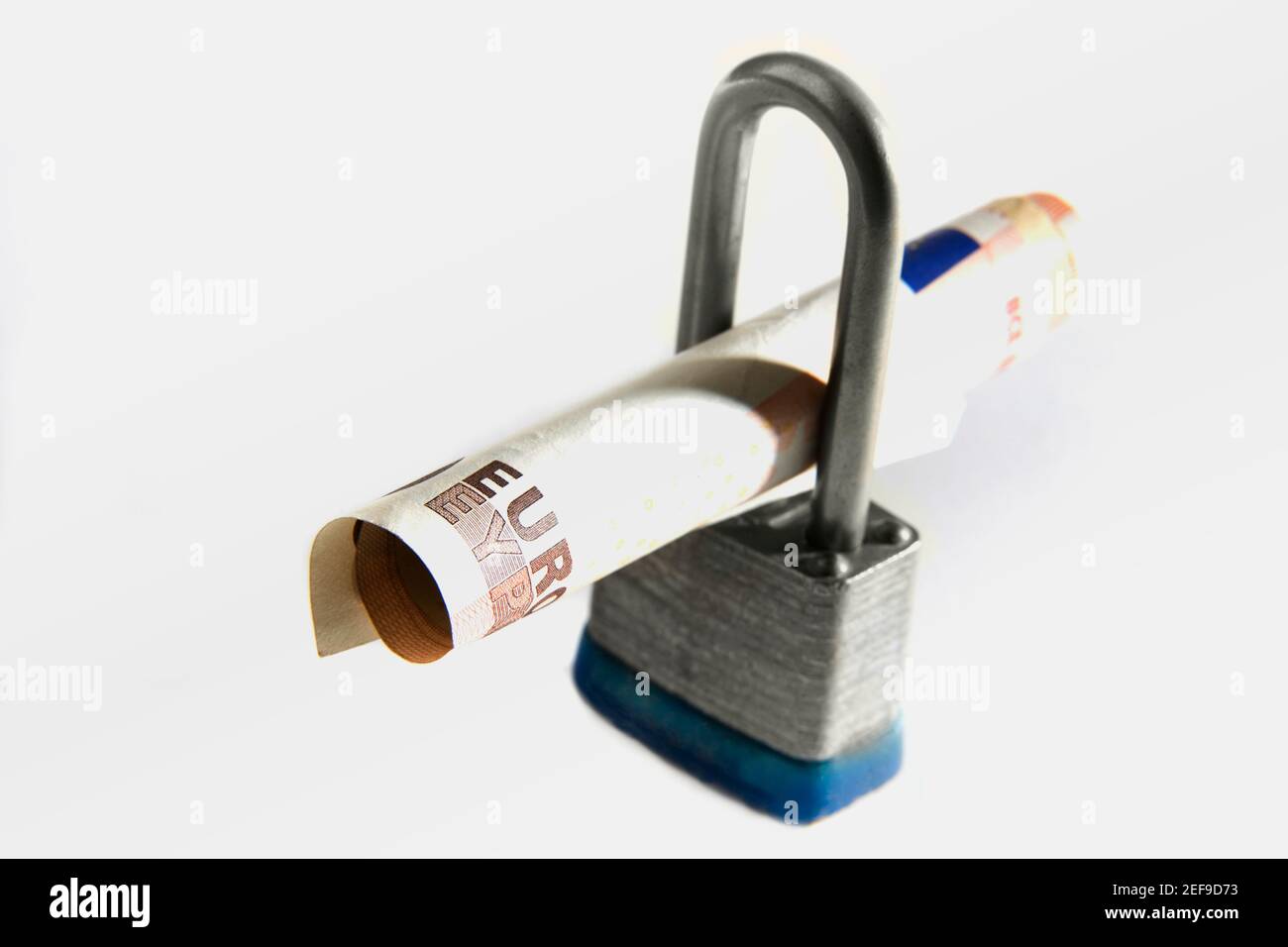 Close-up of a combination lock and Euro dollars Stock Photo