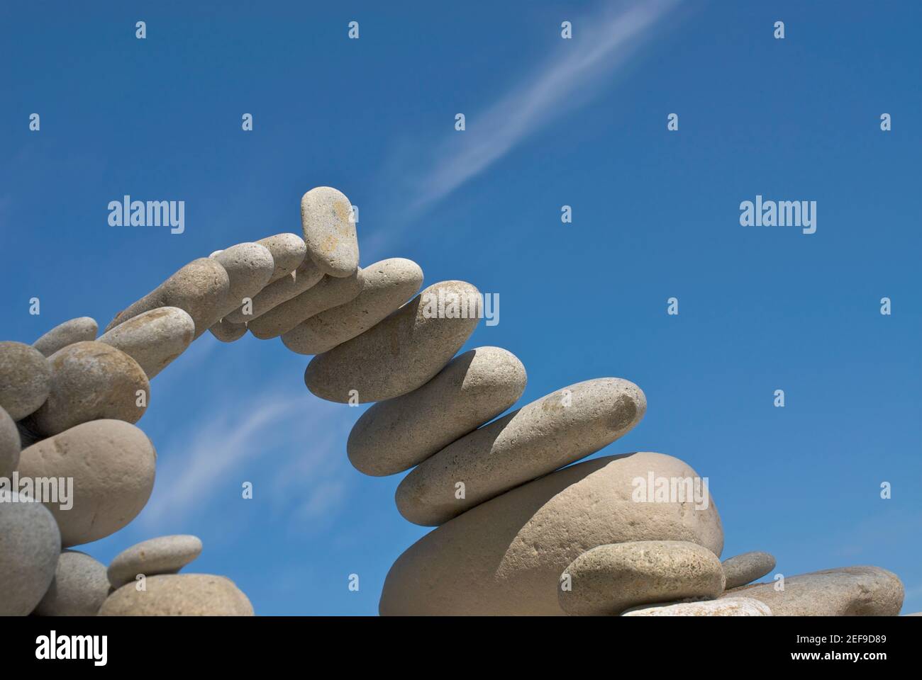 Low angle view of stones arranged in an arch shape Stock Photo