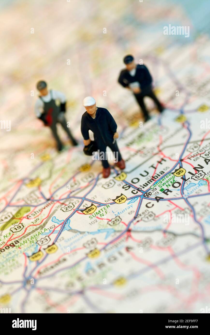 Figurines map hi-res stock photography and images - Alamy