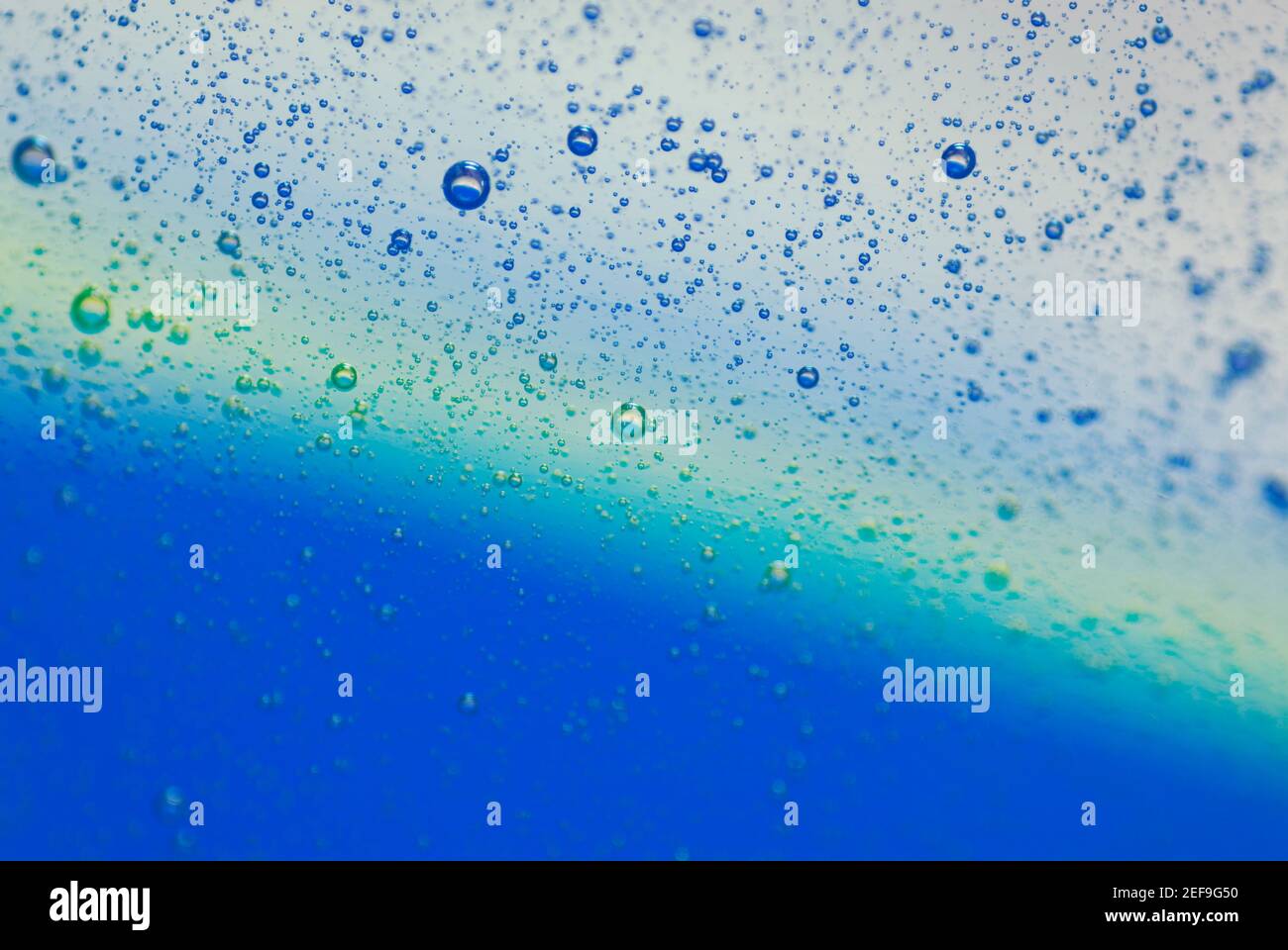Close up of water droplets on a blue background Stock Photo - Alamy