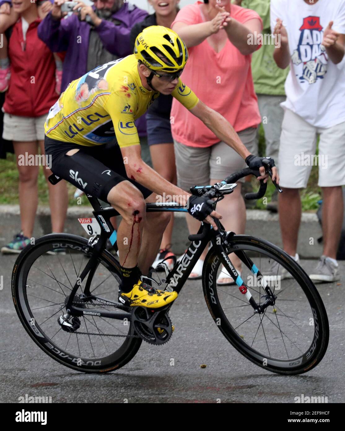 Cycling - Tour de France cycling race - The 146 km (90 miles) Stage 19 from Albertville to Saint-Gervais Mont Blanc, France - 22/07/2016  - Yellow jersey leader Team Sky rider Chris Froome of Britain rides after a fall during the stage.   REUTERS/Kenzo Tribouillard/Pool   Picture Supplied by Action Images Stock Photo