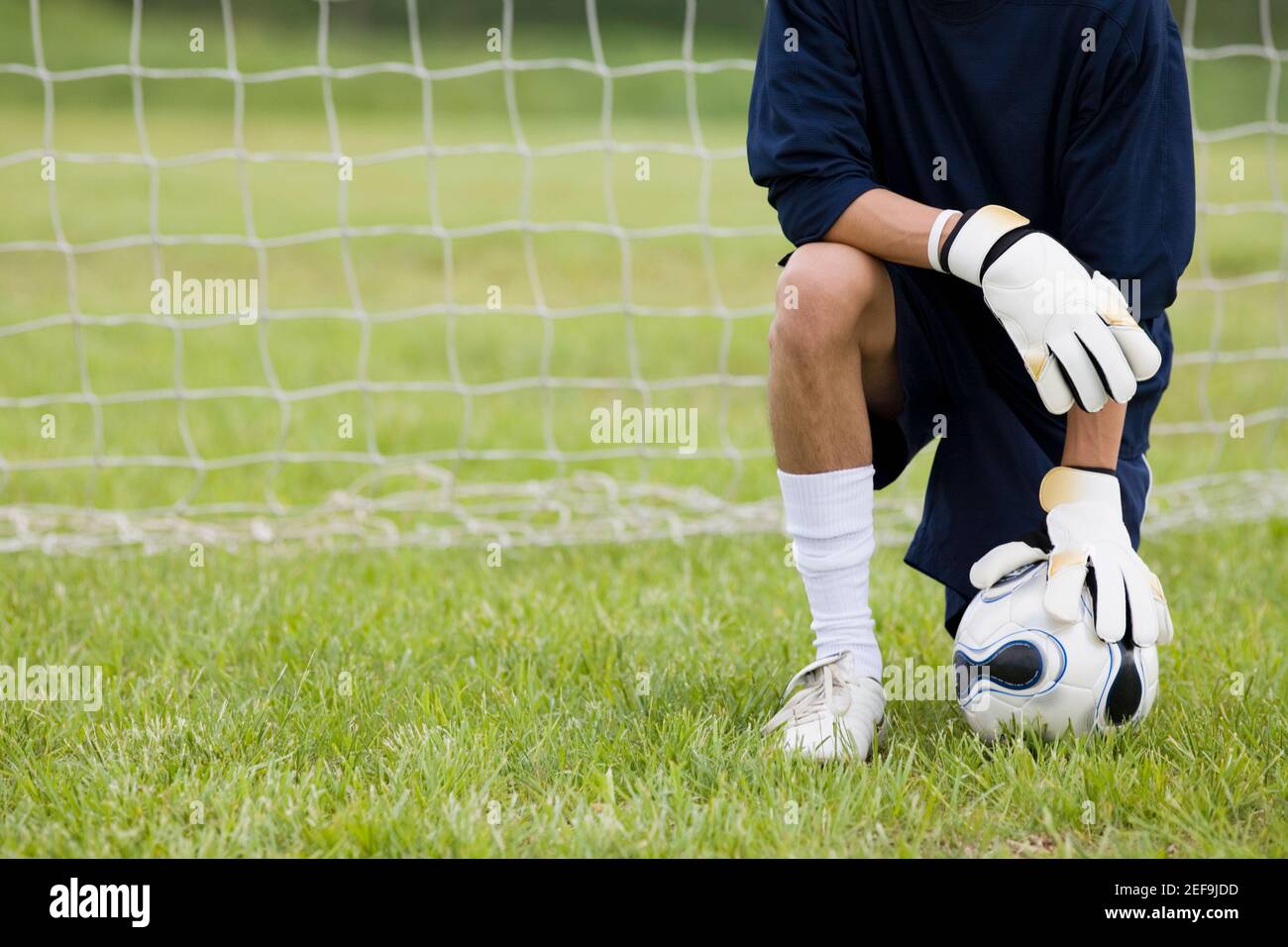 Closeup of a goalie touching a soccer ball Stock Photo Alamy