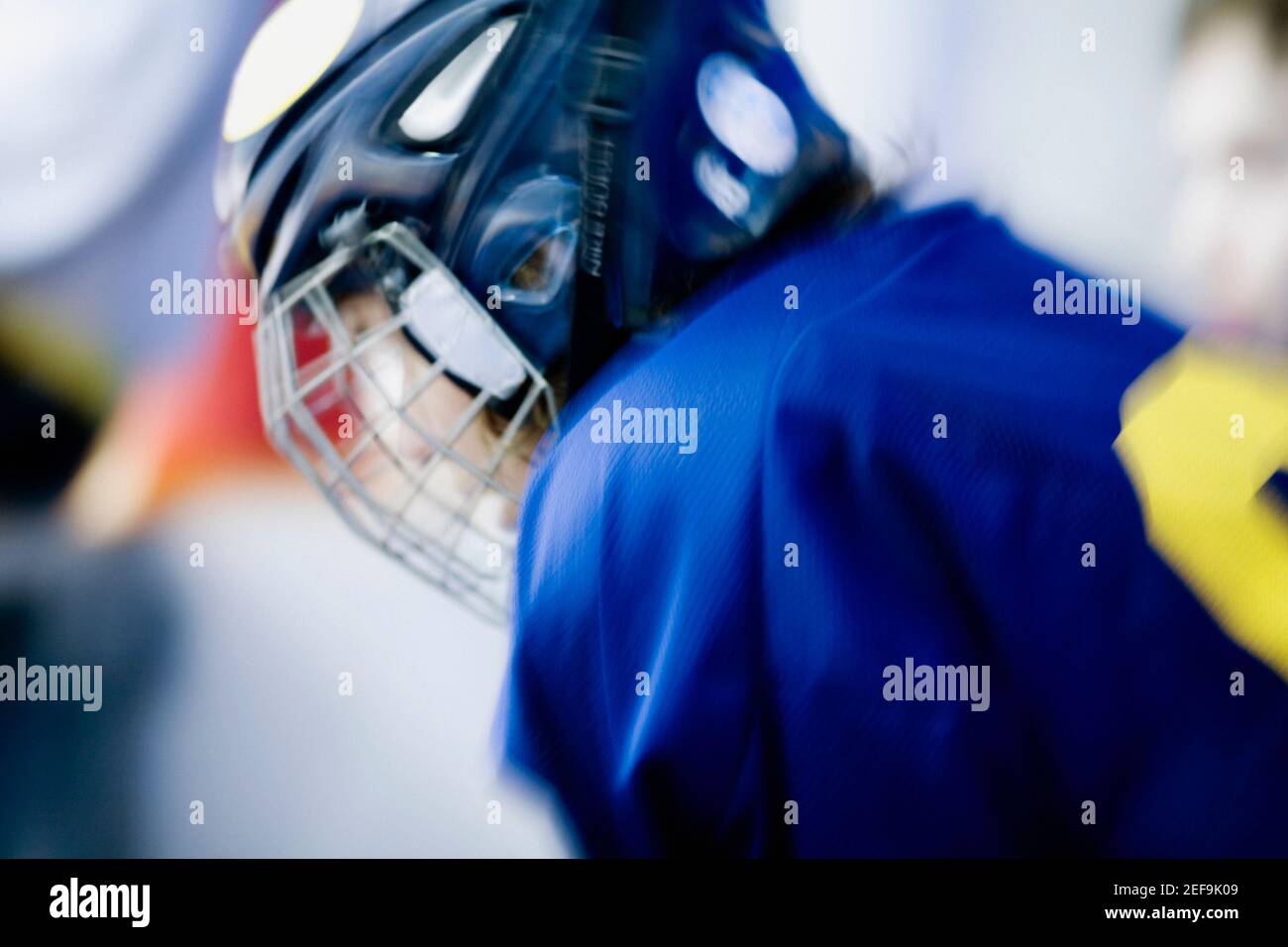 Side profile of an ice hockey player wearing a helmet Stock Photo Alamy