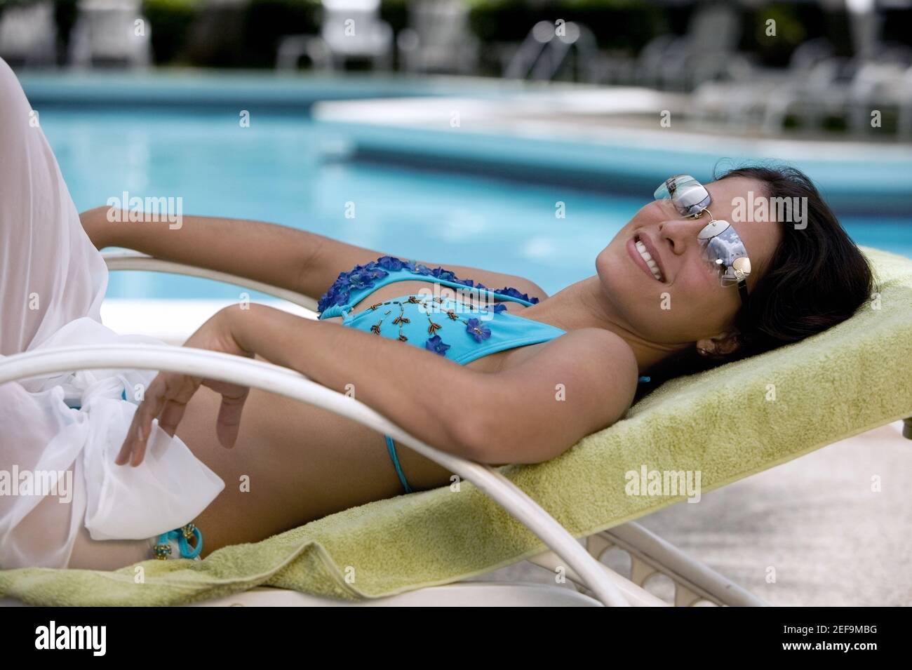 Woman lying down in bikini hi-res stock photography and images - Page 2 -  Alamy