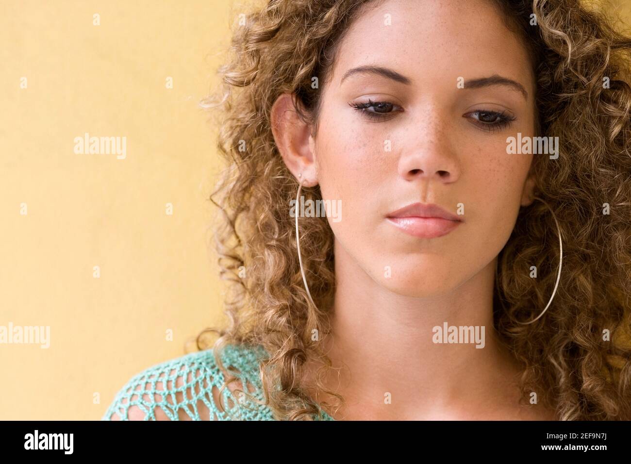 Close-up of a teenage girl thinking Stock Photo