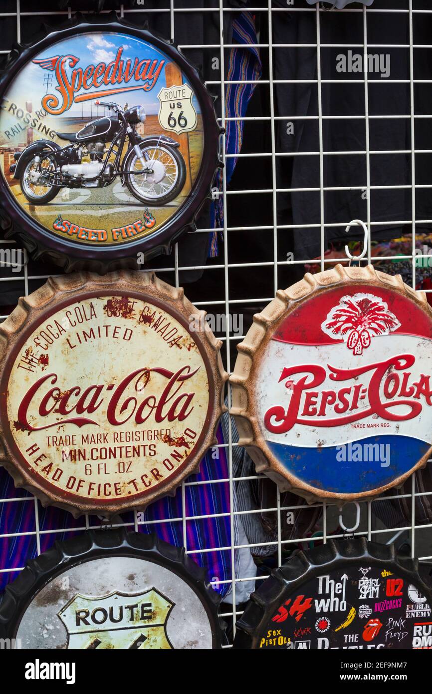 Large bottle cap tops decorations for sale on stall at Wimborne Folk