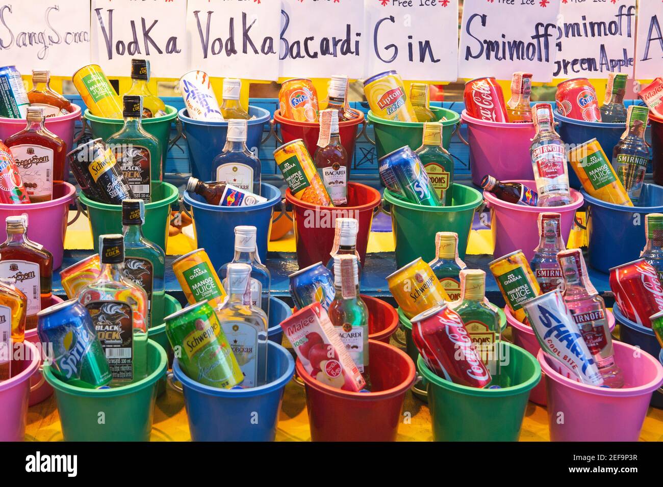 Buckest of mixer alcoholic drinks for sale, Haad Rin (Hat Rin) party beach, Koh Phangan, Thailand Stock Photo