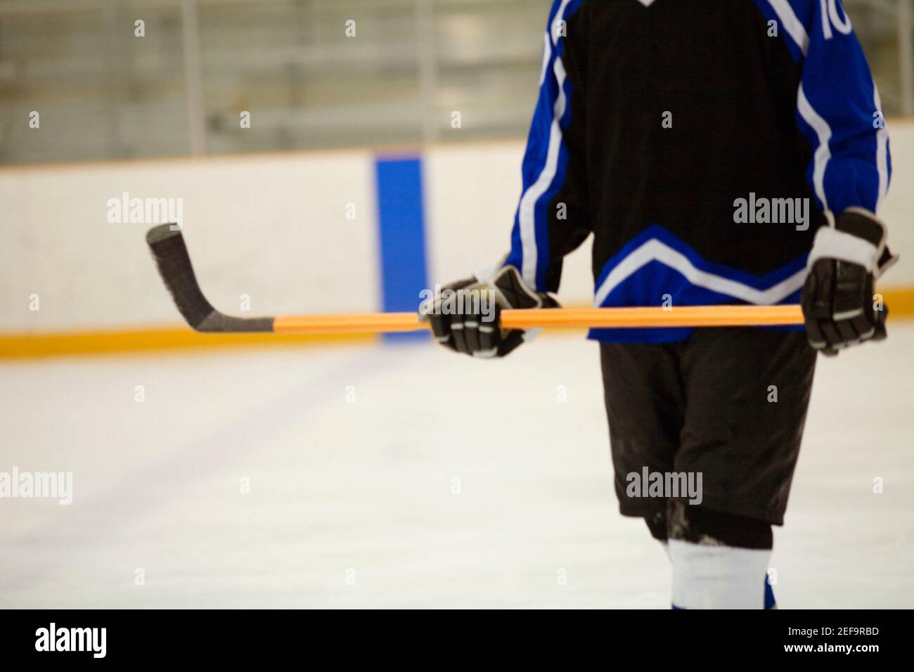 Mid section view of an ice hockey player Stock Photo Alamy