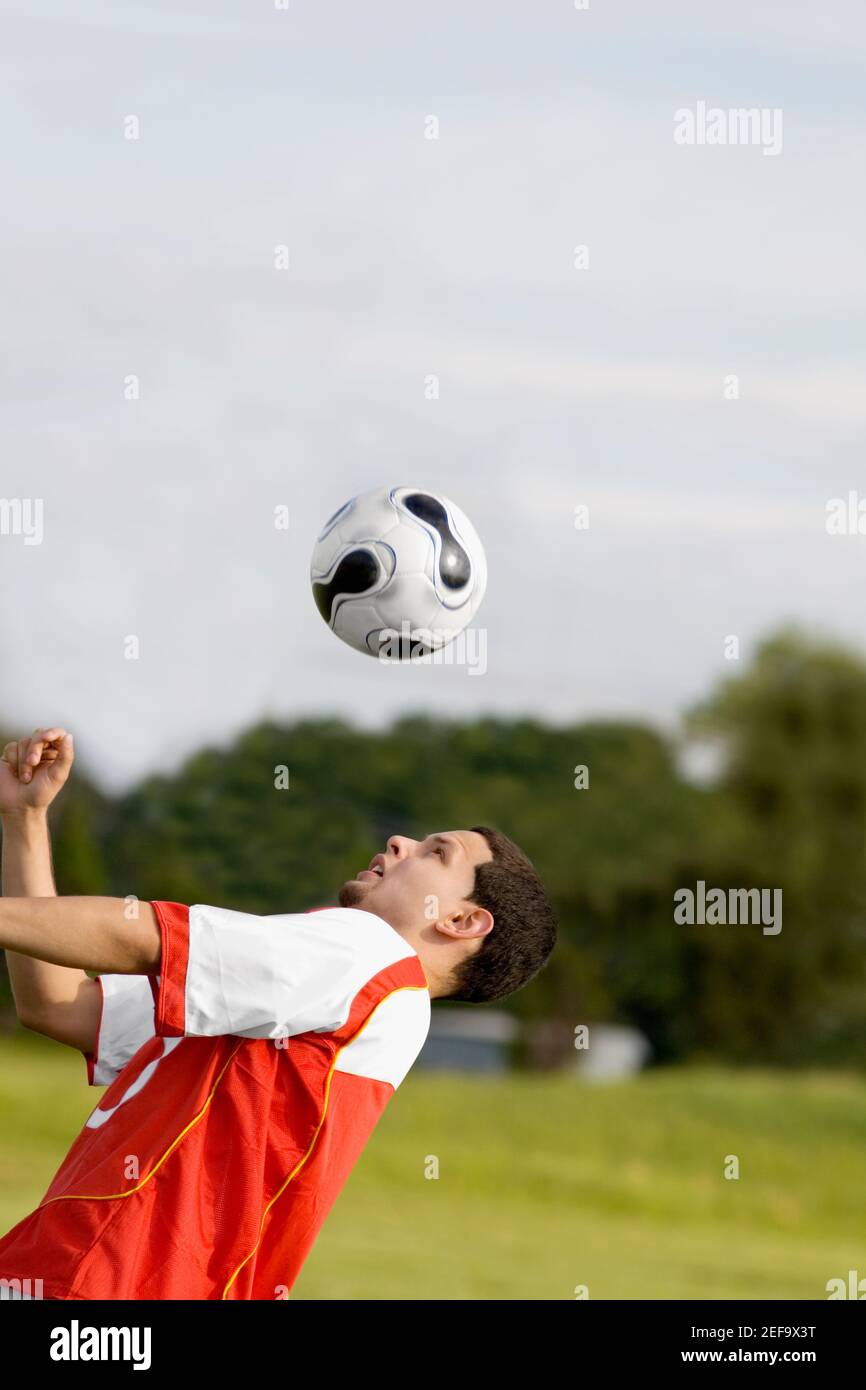 Closeup of a soccer player heading a soccer ball Stock Photo Alamy