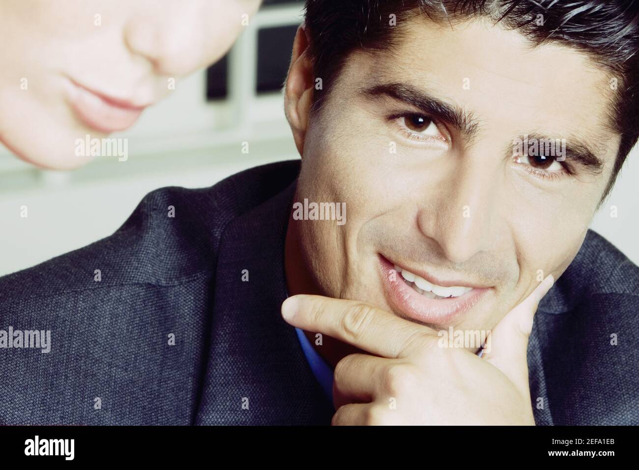 Portrait of a young man smiling Stock Photo - Alamy