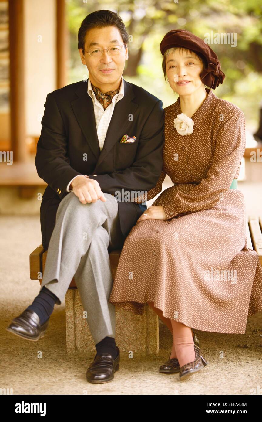 Portrait of a senior man and a mature woman sitting together Stock Photo