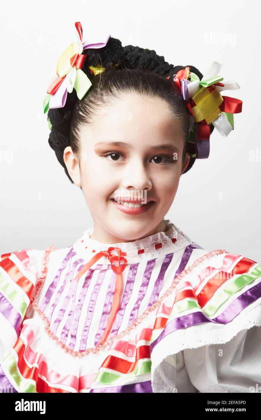 Portrait of a girl wearing traditional clothing and smiling Stock Photo ...
