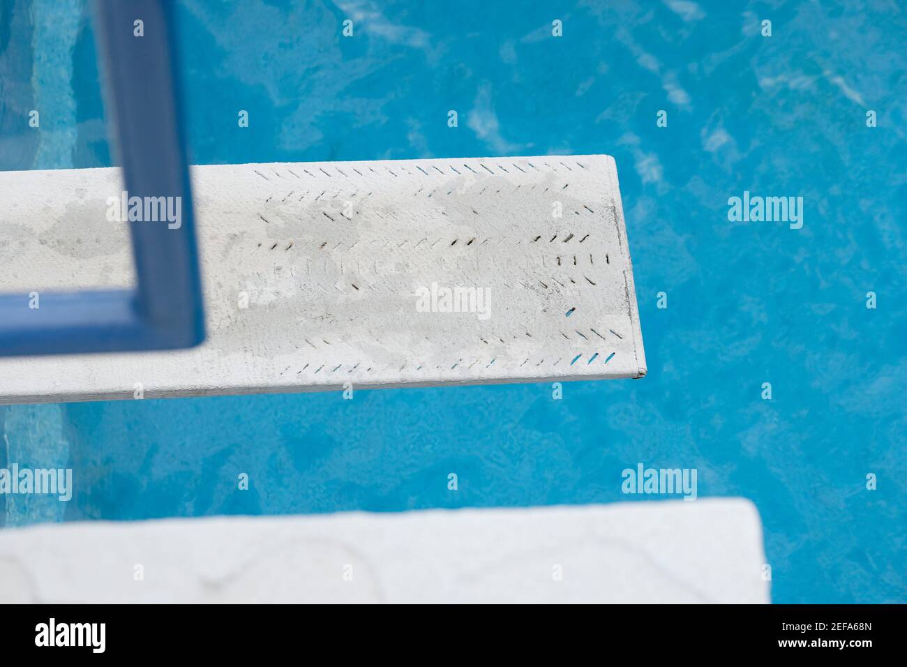 Diving board near a swimming pool Stock Photo Alamy