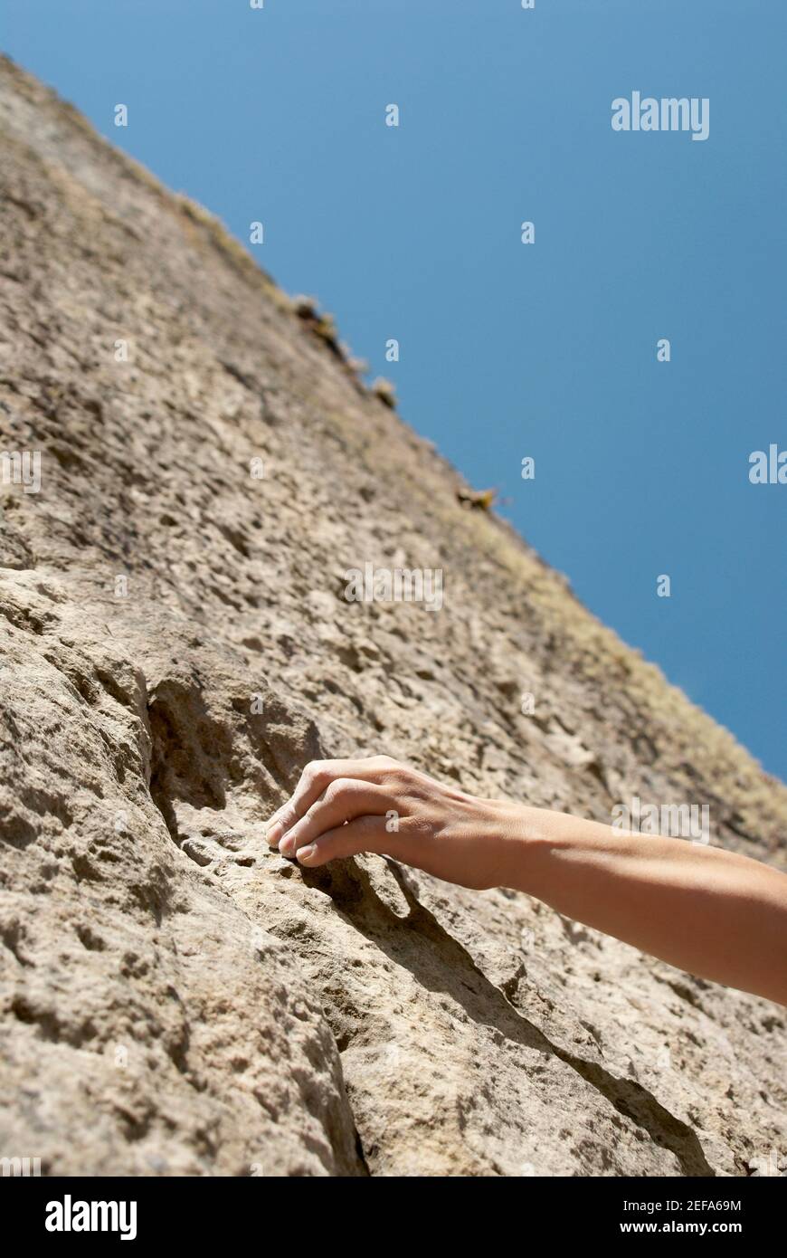 Hand gripping rock hi-res stock photography and images - Alamy
