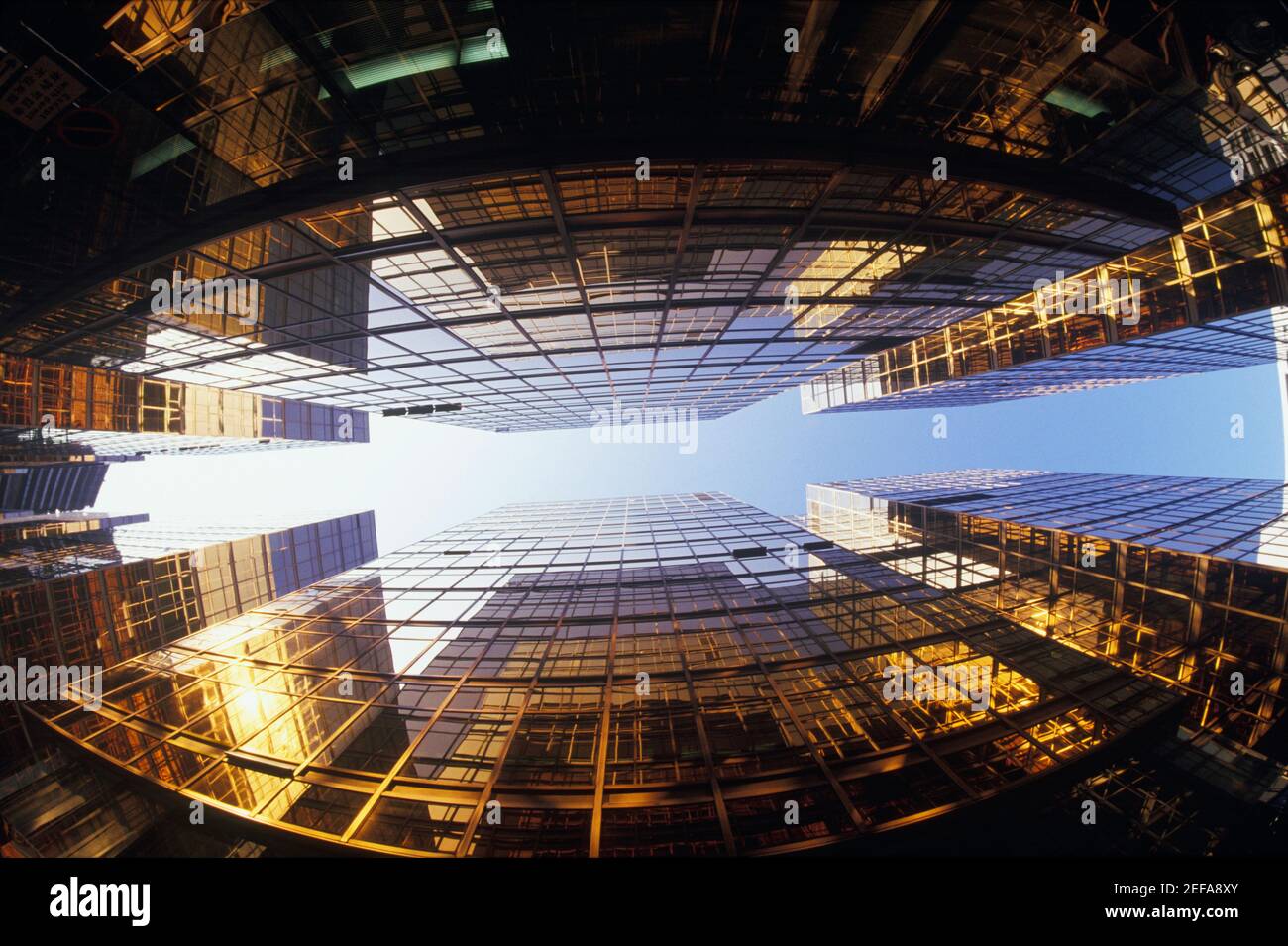 Low angle view of skyscrapers in a city, Hong Kong, China Stock Photo ...
