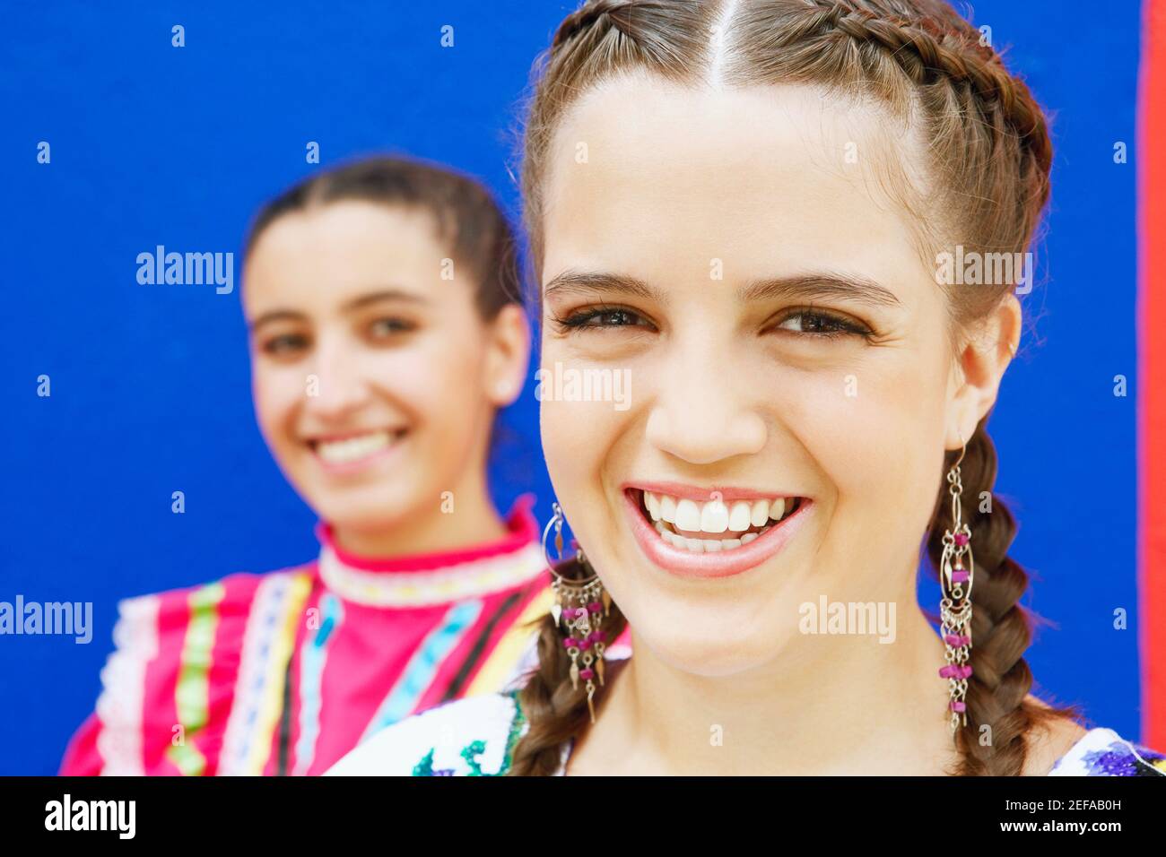 Two young women white blue hi-res stock photography and images - Alamy